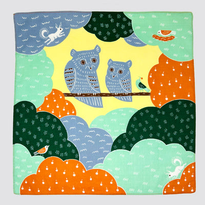 Animal Furoshiki - Owl depicts a pair of owls perched on a tree branch surrounded by small creatures of the forest.
