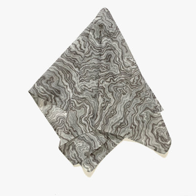 A light bandana - india ink marble pulled in the center and splayed.