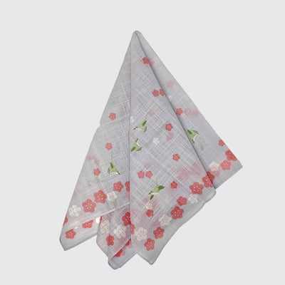 A light bandana - plum blossom pulled in the center and splayed.