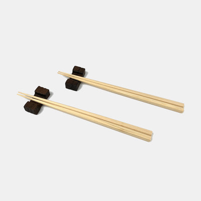 2 kiri chopstick rests, each holding a pair of Natural Noto hiba chopsticks.