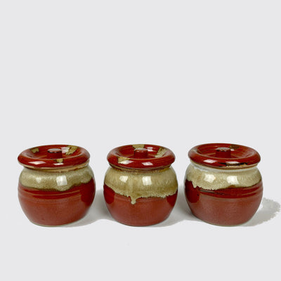 3 mini porcelain jars.