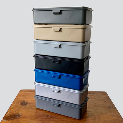 All 7 colors of Trusco tool box T-190 stacked up: (from top) matte olive drab, matte sand, matte light gray, matte black, metallic blue, silver, matte dark gray.